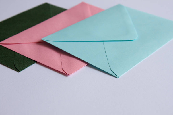  Colorful envelopes and white background. - Фото, изображение