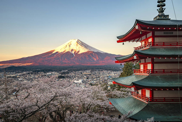 Red pagoda and red Fuji in morning time - Photo, Image
