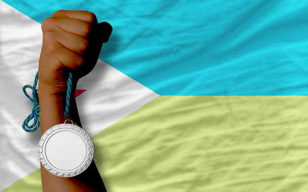 Silbermedaille für Sport und Nationalflagge von Dschibuti - Foto, Bild