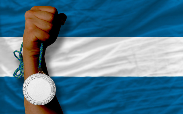 Silbermedaille für Sport und Nationalflagge von El Salvador - Foto, Bild