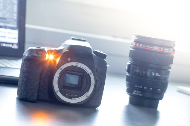 Professional camera: Reflex camera with open sensor. Lenses in t - Photo, image