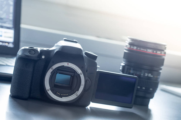 Professional camera: Reflex camera with open sensor. Lenses in t - Photo, image