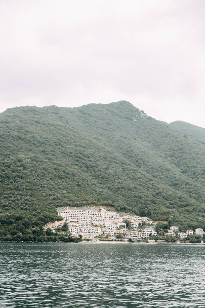  Streets and sights of the old town. Panorama of the city of Perast in Montenegro. - Фото, изображение
