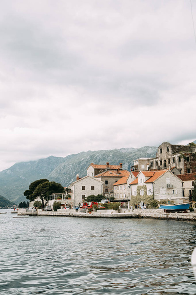 Streets and sights of the old town. Panorama of the city of Perast in Montenegro.  - Фото, изображение
