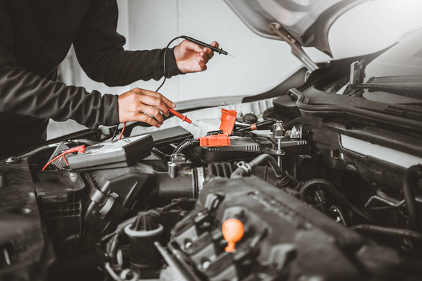 Technician Hands of car mechanic working in auto repair Service  - 写真・画像