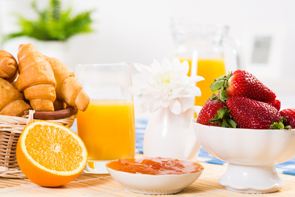 early breakfast, juice, croissants and jam - Photo, Image