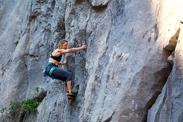 Woman engaged in extreme sport. - Photo, Image