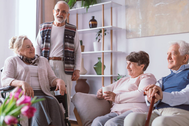 Senior friends spending time together in the retirement home - Fotoğraf, Görsel