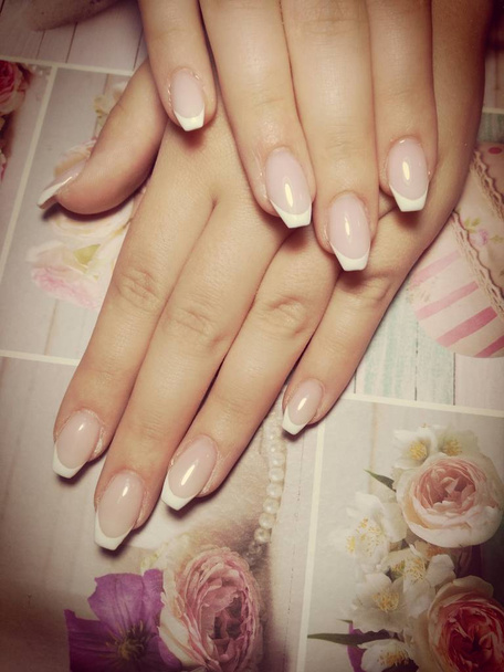 Femininity in front of everything with beautiful manicure - Photo, Image
