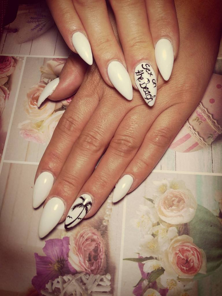 Femininity in front of everything with beautiful manicure - Photo, Image
