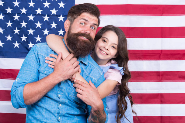 Independence is happiness. Independence day holiday. Father american bearded hipster and cute little daughter with USA flag. Freedom fundamental right. How do americans celebrate independence day - Фото, изображение