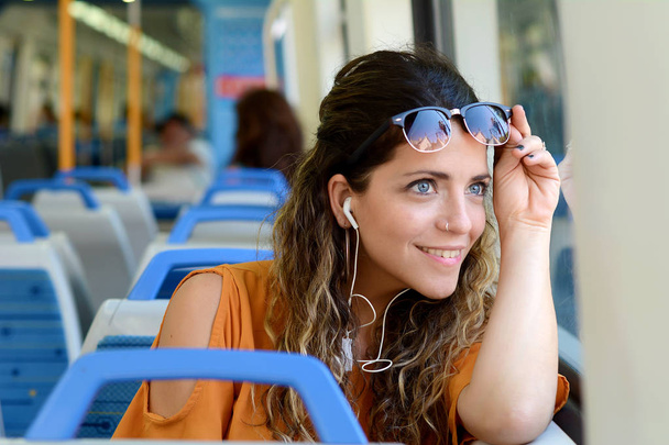 Business woman traveling by train - Fotó, kép