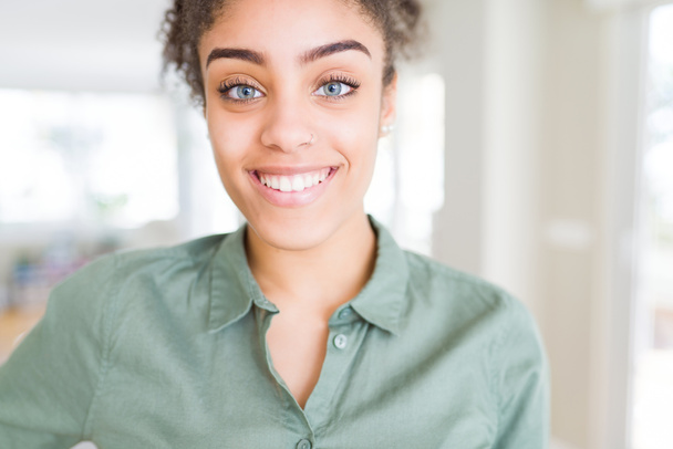Beautiful young african american woman smiling cheerful, friendl - Φωτογραφία, εικόνα