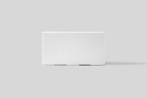 Realistische witte lege kartonnen doos mock up geïsoleerd op licht grijze achtergrond. Klaar voor uw ontwerp en branding. 3D-rendering. Hoge resolutie. - Foto, afbeelding