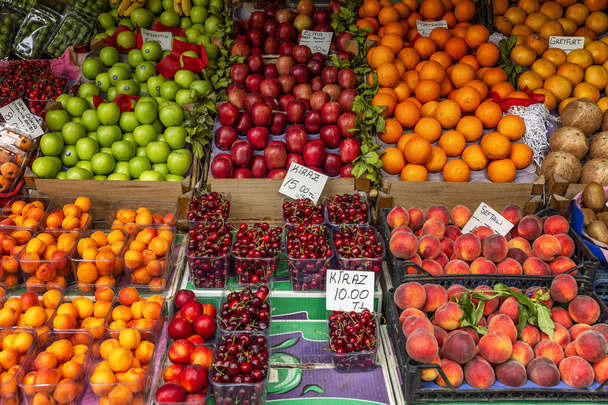 Izmir, Turkey, 05/20/2019: Heap of fruit on the market. Close-up. - Фото, изображение