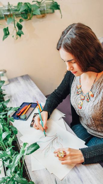 creative process female painter drawing plants - Fotó, kép