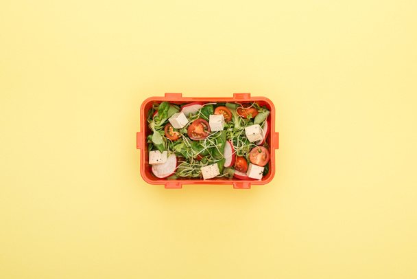 top view of lunch box with salad and vegetables - Photo, Image