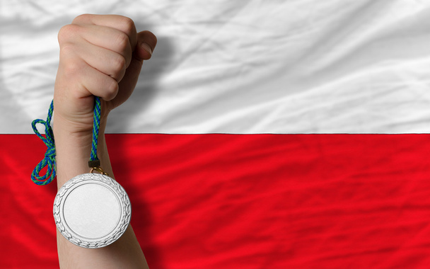 Médaille d'argent pour le sport et drapeau national de la Pologne
 - Photo, image