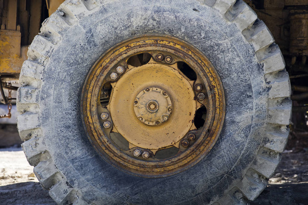 Closeup of the dirty big cargo truck wheel - Photo, Image
