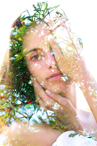 Double exposure of a natural beauty with hand covering half her  - Fotografie, Obrázek