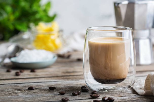 Keto, ketogenic bulletproof coffee with coconut oil and ghee butter - Photo, image