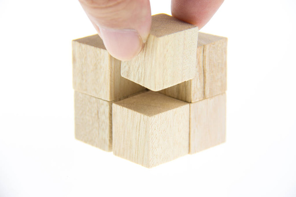 hand holding wooden toy blocks - Zdjęcie, obraz