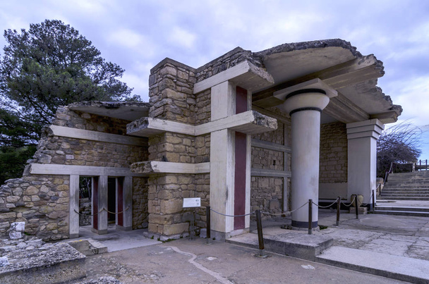 Knossos, Crete - Greece. The South Propylaeum at the archaeological site of Knossos which is the largest Bronze Age archaeological site on Crete and has been called Europe's oldest city. Cloudy sky - Photo, Image