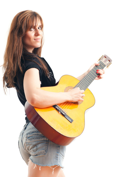 woman holding a guitar - Foto, Bild