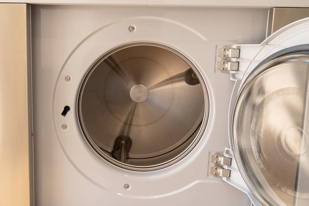 Washing machine with an open Front door detail - Fotoğraf, Görsel