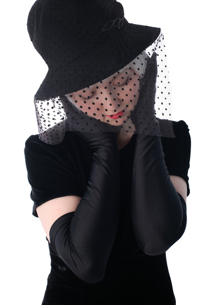 Lovely woman in hat hiding at veil - Fotografie, Obrázek