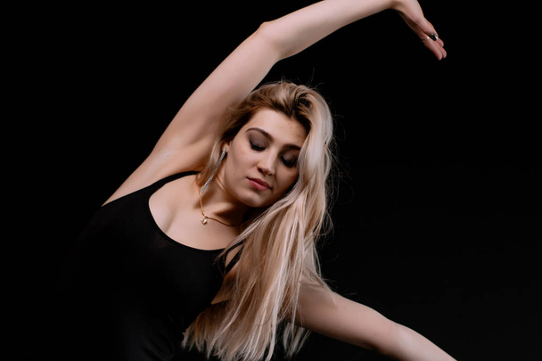 Beautiful slim young female modern jazz contemporary style ballet dancert on a loft studio background - Photo, Image