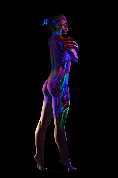 Slim nude model with glowing pattern on body - Fotoğraf, Görsel