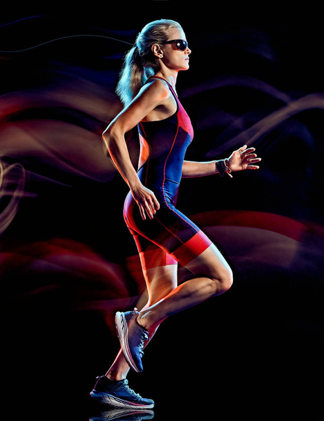 woman triathlon triathlete runner running joogger jogging isolated black background - Foto, Imagem