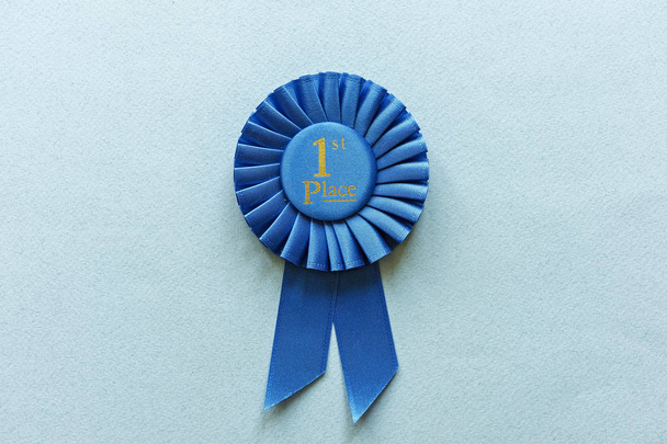 Champion oder Sieger 1. Platz blaue Rosette - Foto, Bild