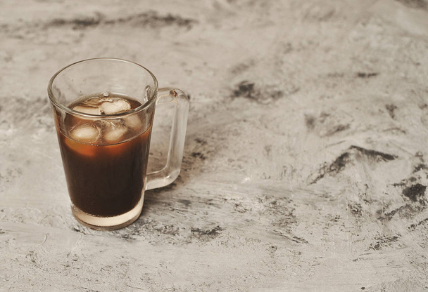 Iced coffee on stone background. Summer cold drink. - Photo, Image
