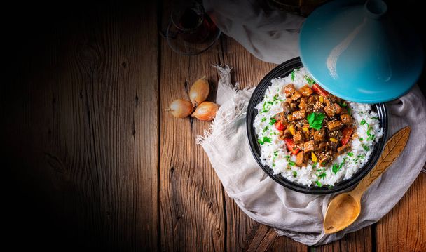 Tajin beef stew with rice paprika and sesame seeds - Photo, Image