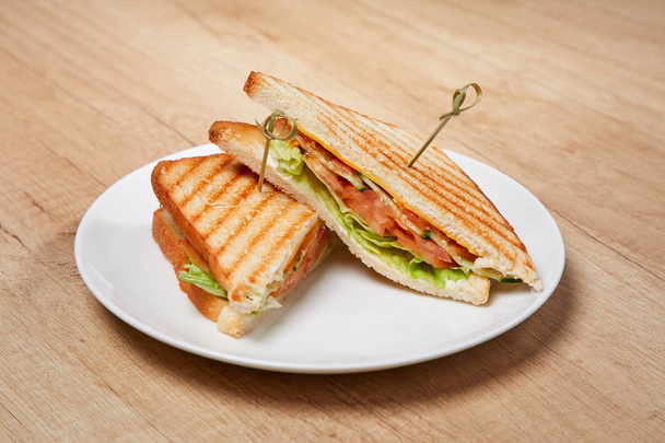 sandwiches with ham on white plate, close-up  - Photo, Image