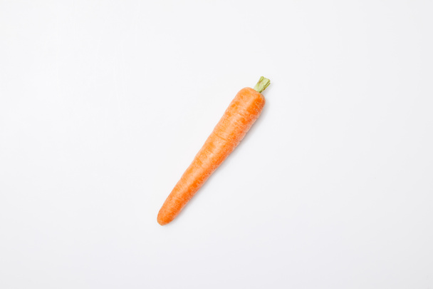 top view of organic carrot on white background - Fotó, kép