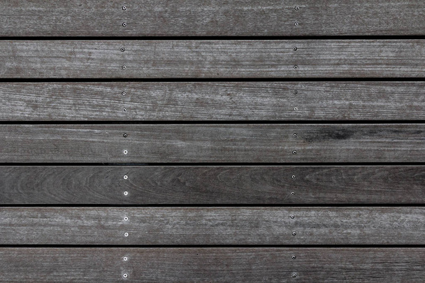 Похмура текстура дерев'яної дошки підлоги. Тло дерев'яного тротуару. Абстрактний візерунок домашньої палуби
 - Фото, зображення