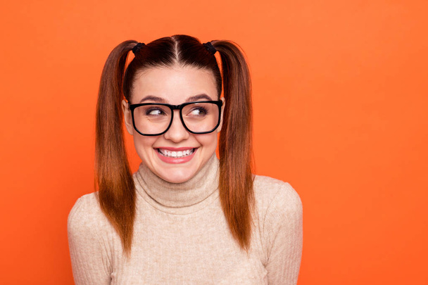 Close up photo charming cute youth millennial college lady studying learning ponder minded have free time rest relax weekend wears specs fashionable trendy turtleneck enjoy isolated orange background - Foto, Bild