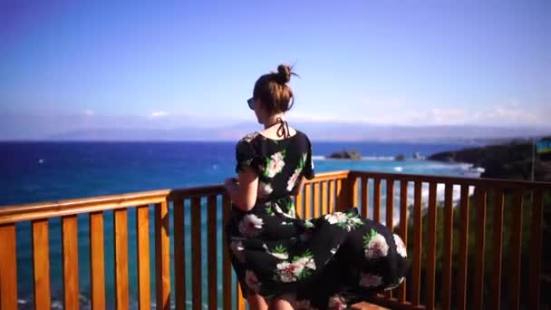 The girl on the observation deck looks at the sea enjoying the beauty of nature. Cyprus. Slow motion. - Imágenes, Vídeo