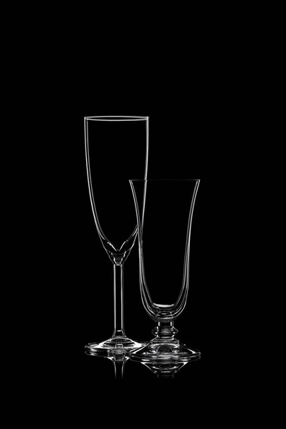 Glassware silhouettes on black. - Foto, Imagen