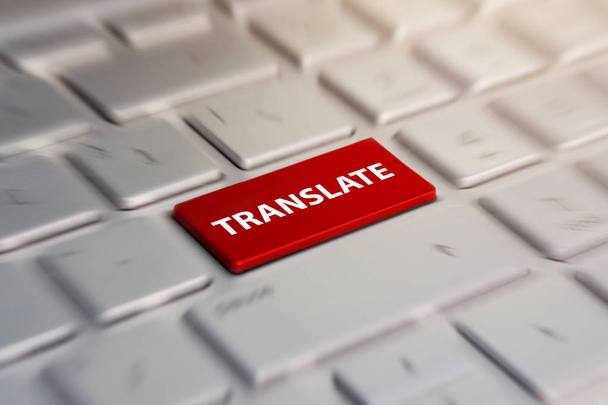 traducir botón en el teclado de la computadora, idiomas de traducción. fondo borroso en movimiento
. - Foto, imagen