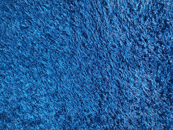 Blue soft cotton sheep wool fluffy fur carpet texture background - Foto, afbeelding