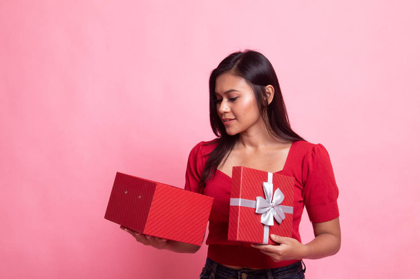 Young Asian woman open a gift box. - Photo, Image