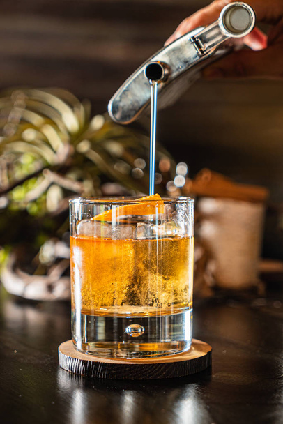 cold creative cocktail in the bar - Foto, Bild