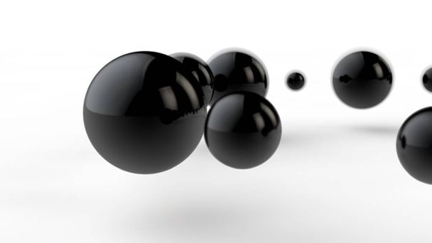 3D illustration of large and small black balls, spheres, geometric shapes isolated on a white background. Abstract, futuristic, cropped image of perfectly shaped objects. 3D rendering - 写真・画像