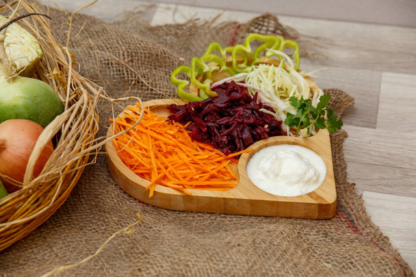 fresh vegetables,onions,cabbage,peppers,carrots ,beets in a wood - Photo, Image