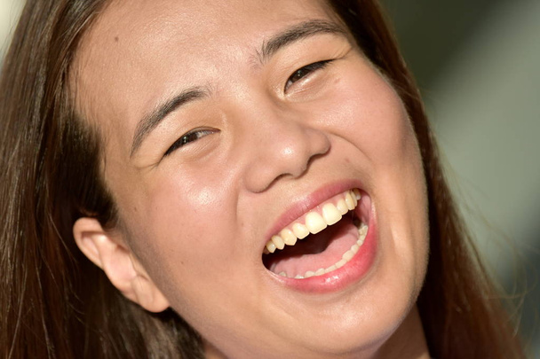 A Diverse Female Laughing - 写真・画像