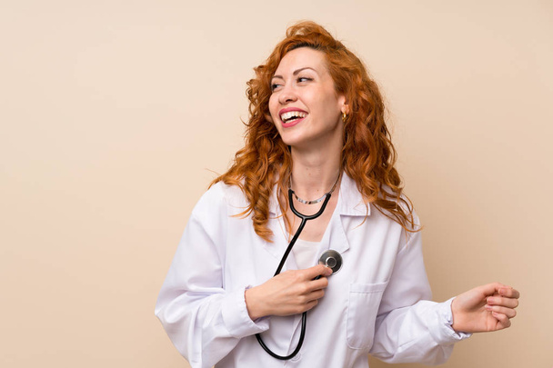 Happy Redhead doctor woman - Photo, Image
